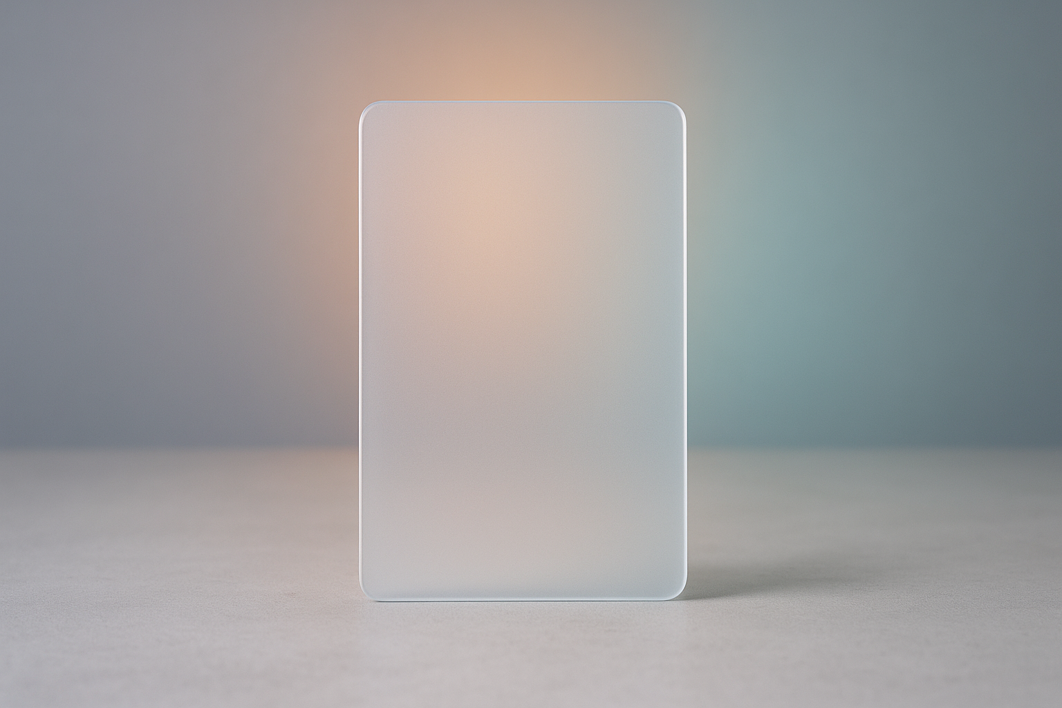 A blank upright frosted glass panel lit from behind by three coloured light sources, taking on the hue of the strongest one.